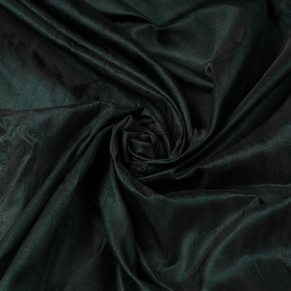 Black Emerald dupion silk fabric arranged in a swirl showing iridescent black and emerald green raw silk texture