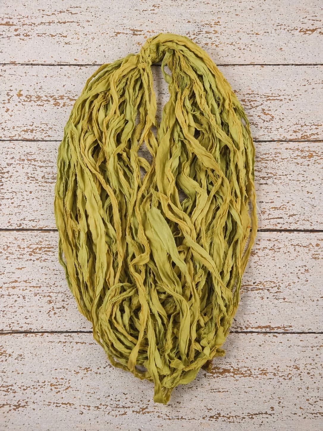Olive green chiffon silk ribbon yarn skein with soft flowing texture