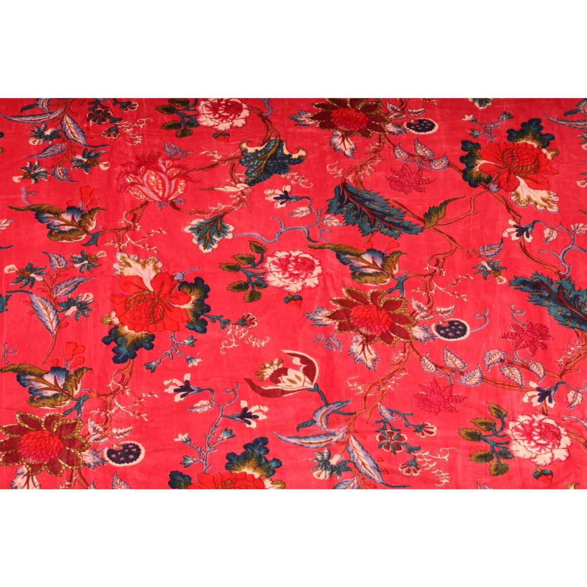 Deep red cotton velvet with hand-printed orange and blue flowers – flatlay
