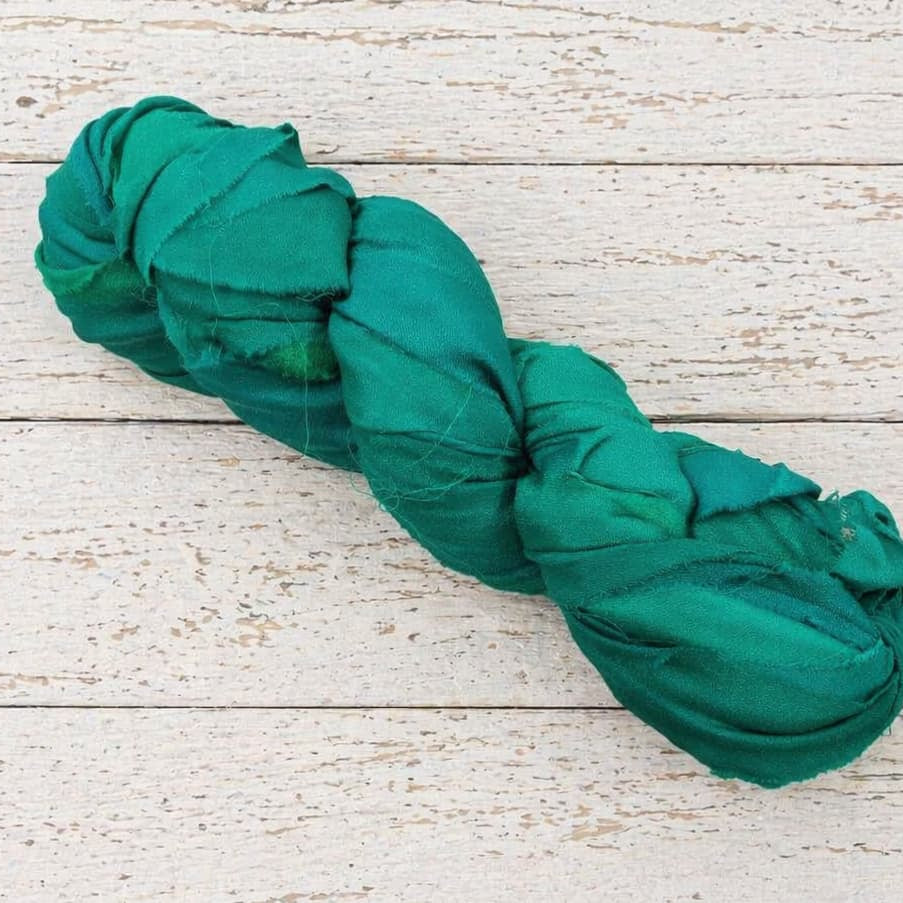 Emerald chiffon silk ribbon yarn single skein in rich jewel green