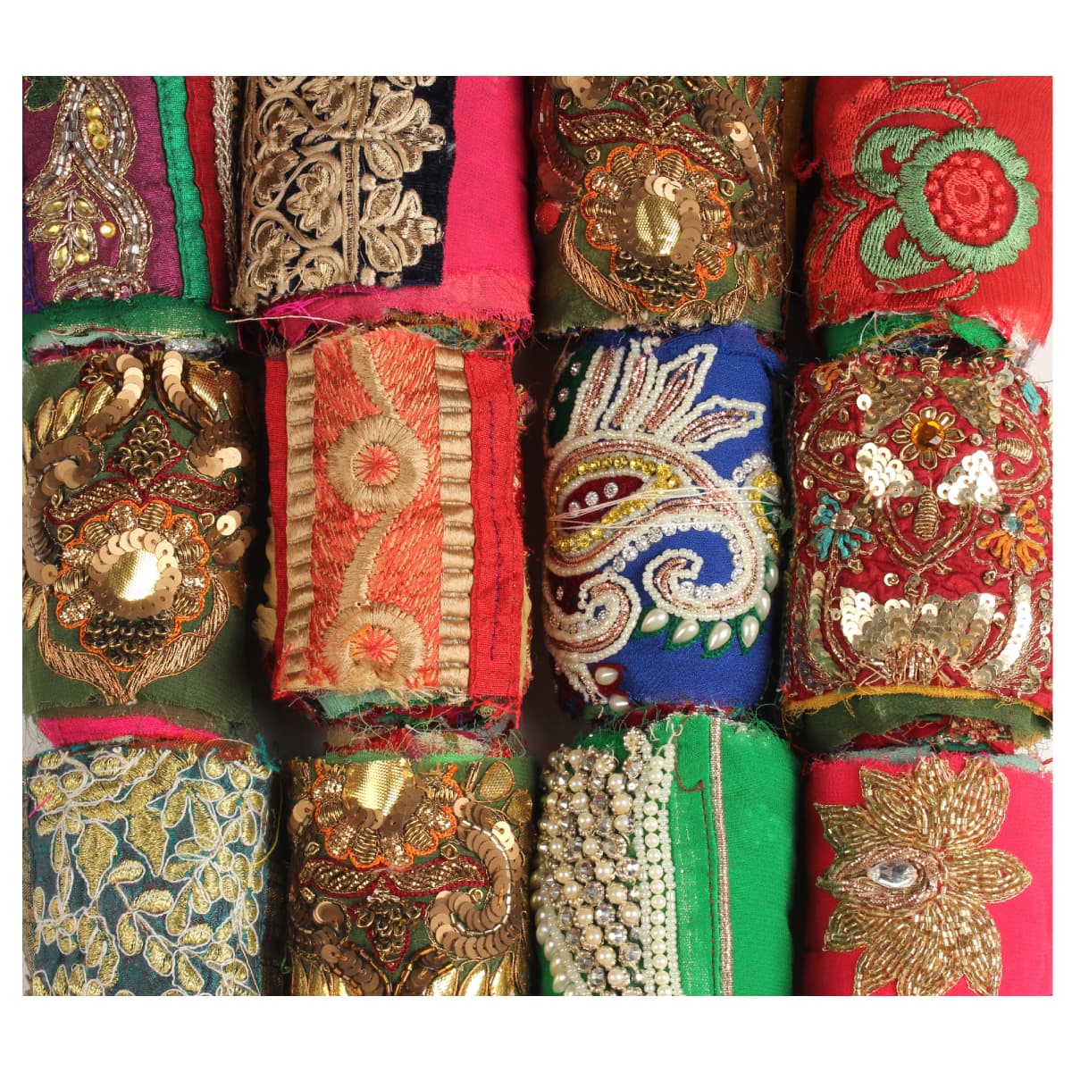 Styled shot of embellished Saree Silk Ribbon rolls showing unique designs