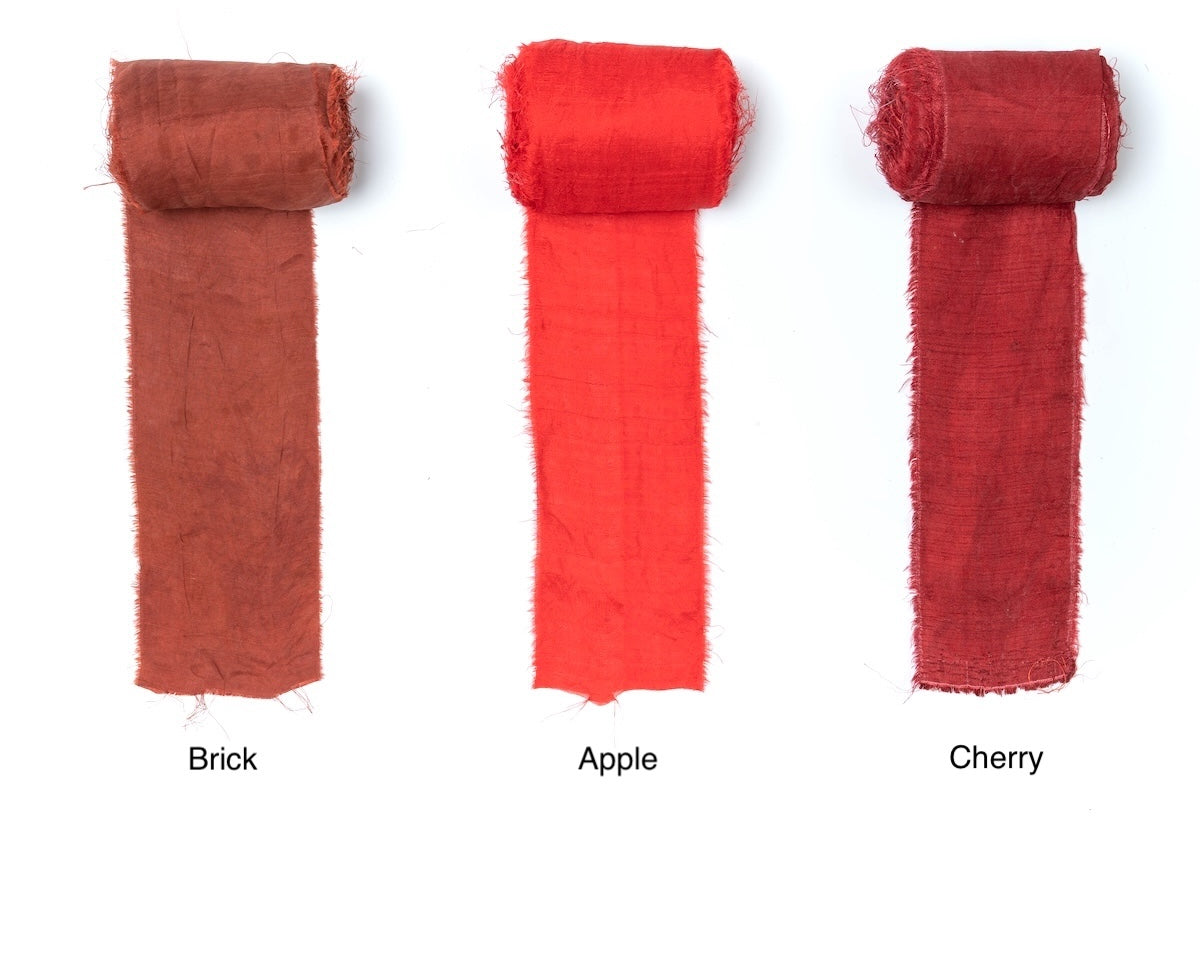 Extra wide sari silk ribbon in shades of red.