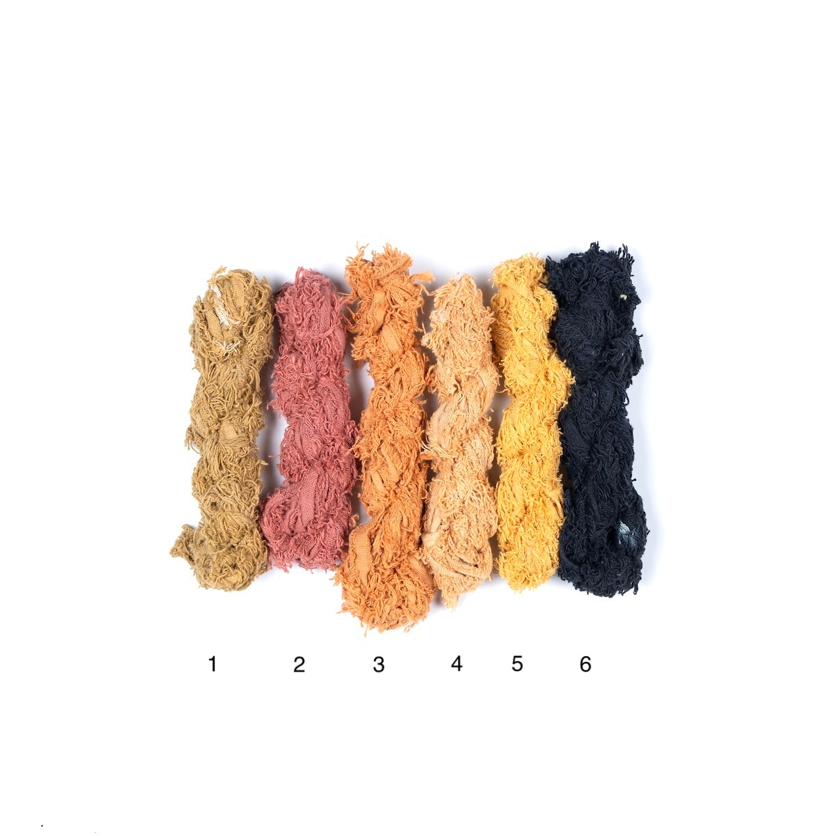 Fuzzy cotton ribbon in yellow, brown, and black shades for crafting and DIY projects