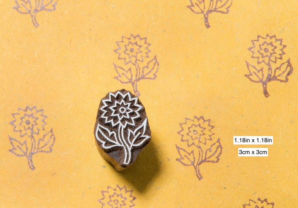 Small floral hand carved wooden block stamp printed as delicate repeating flower motif