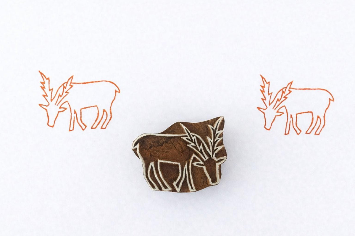 Hand carved wooden deer stamp for block printing on fabric and paper