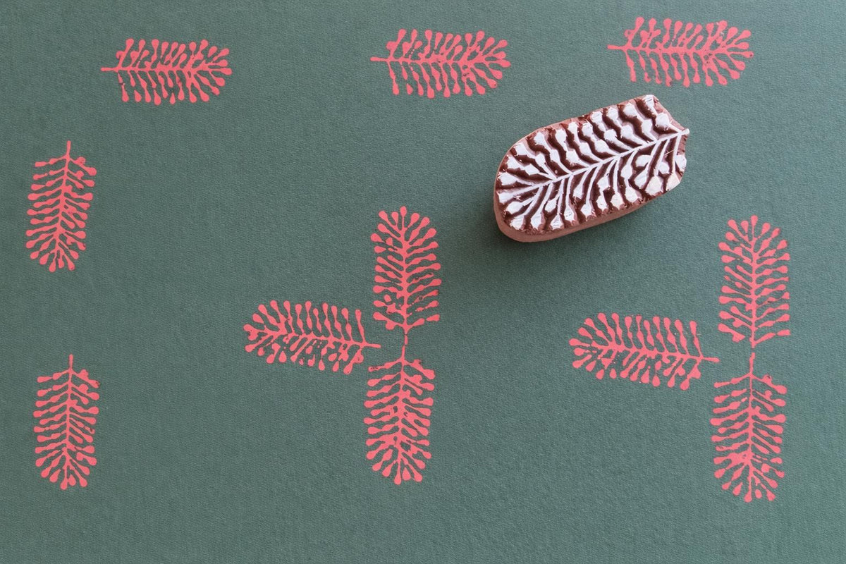 Hand carved wooden stamp printing simple leaf branch pattern