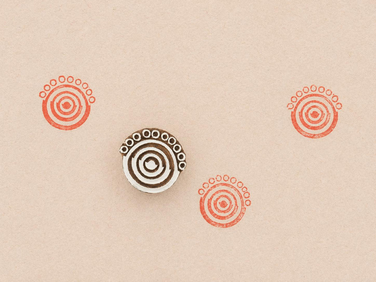 Hand carved wooden printing stamp with tribal circular geometric design for fabric printing, textile patterns, and clay pottery