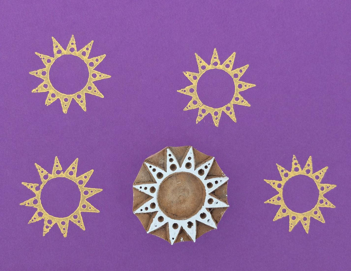 Hand carved wooden printing stamp with sun halo geometric design for fabric printing, textile patterns, and clay pottery