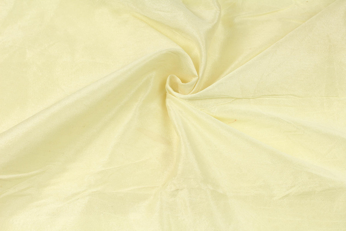 Vanilla cream faux dupioni fabric showing a soft textured silk-like surface and gentle sheen.