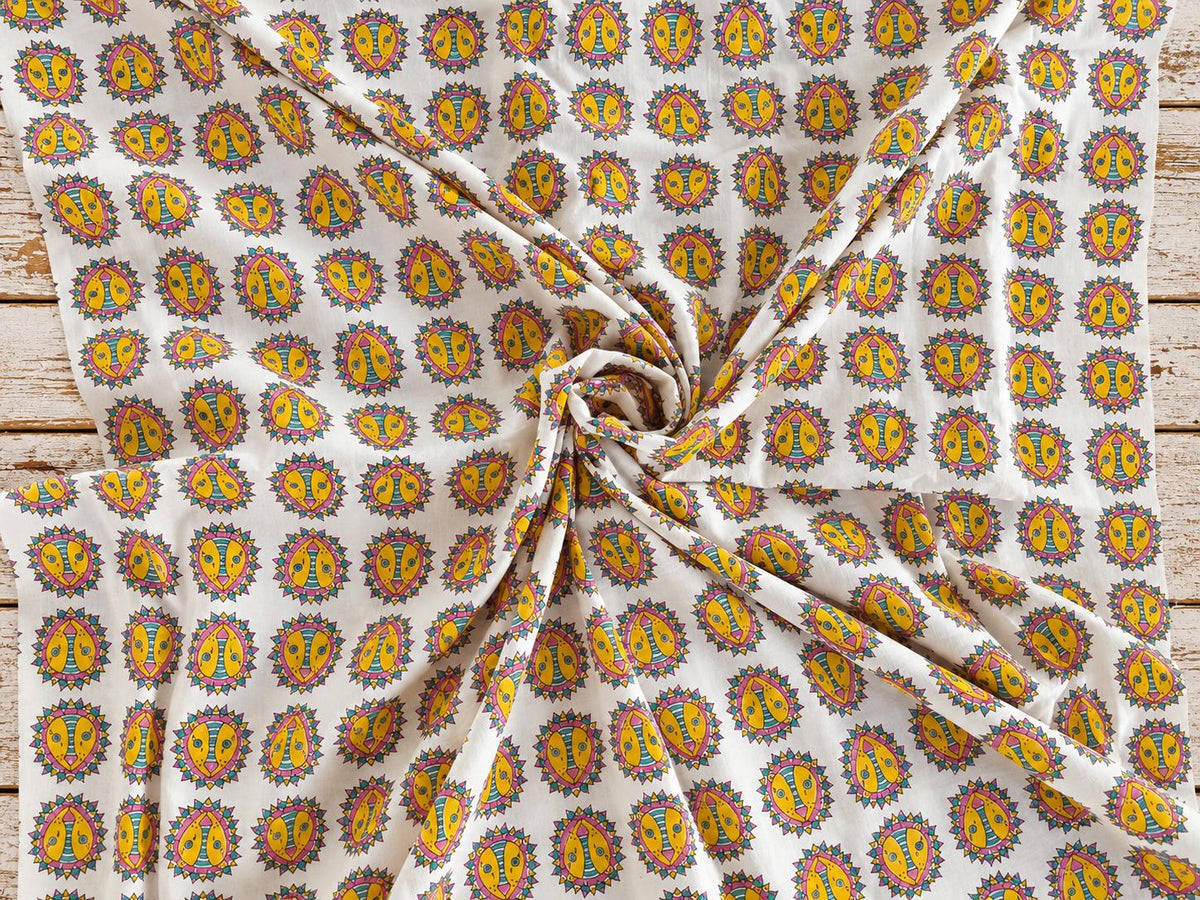 Colourful Indian folk lion block print on soft cotton fabric shown in a flowing drape