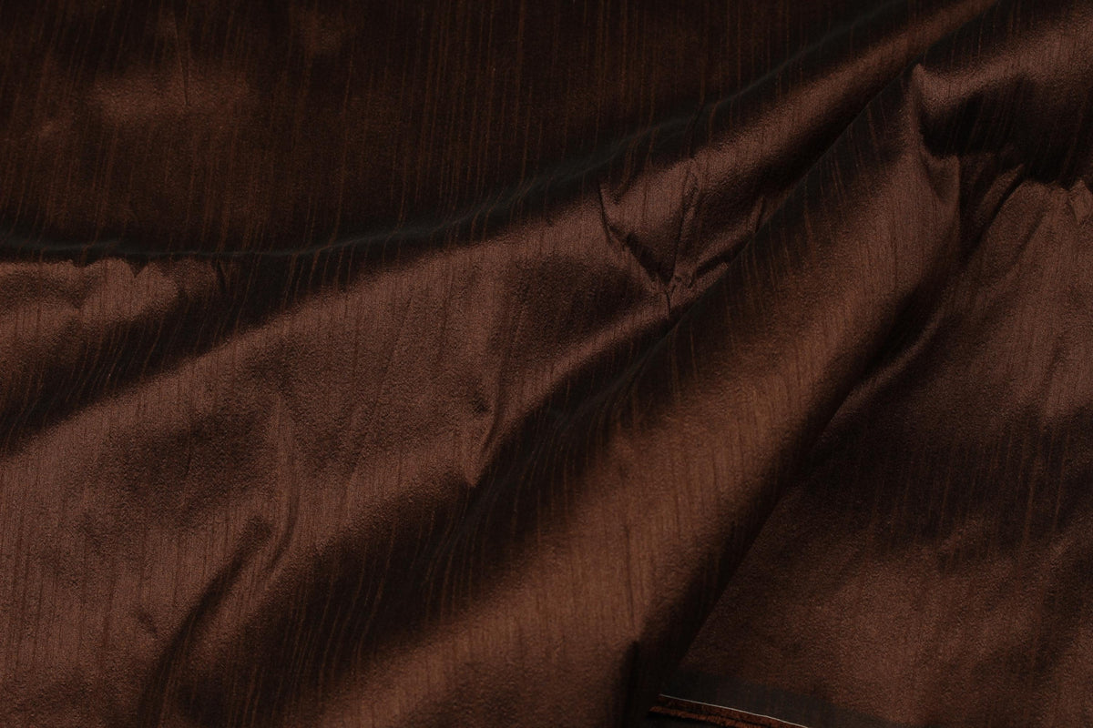 Deep chocolate brown faux dupioni fabric draped to show its soft sheen and texture