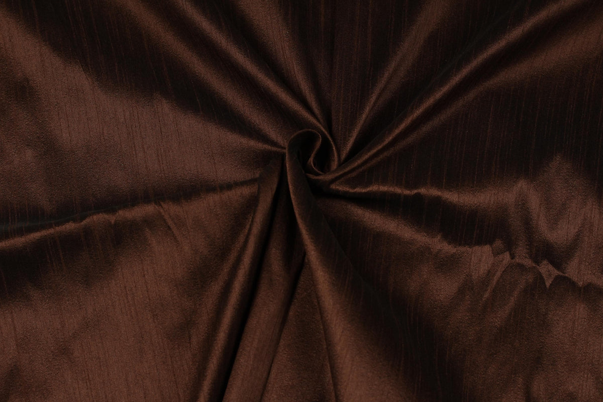 Chocolate brown textured faux silk fabric arranged in folds to display its dupioni look