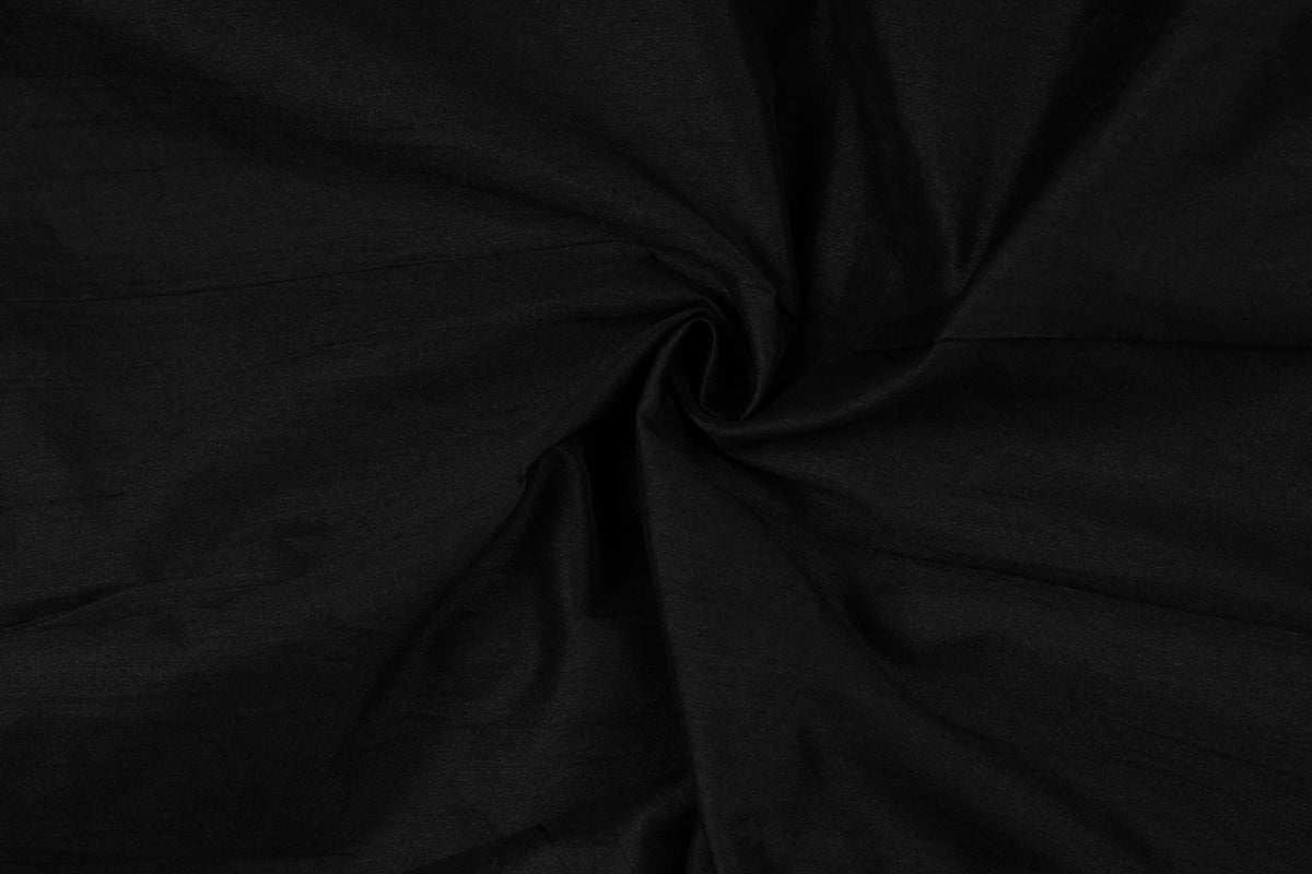 Jet black faux dupioni fabric showing its subtle woven texture and deep black colour.