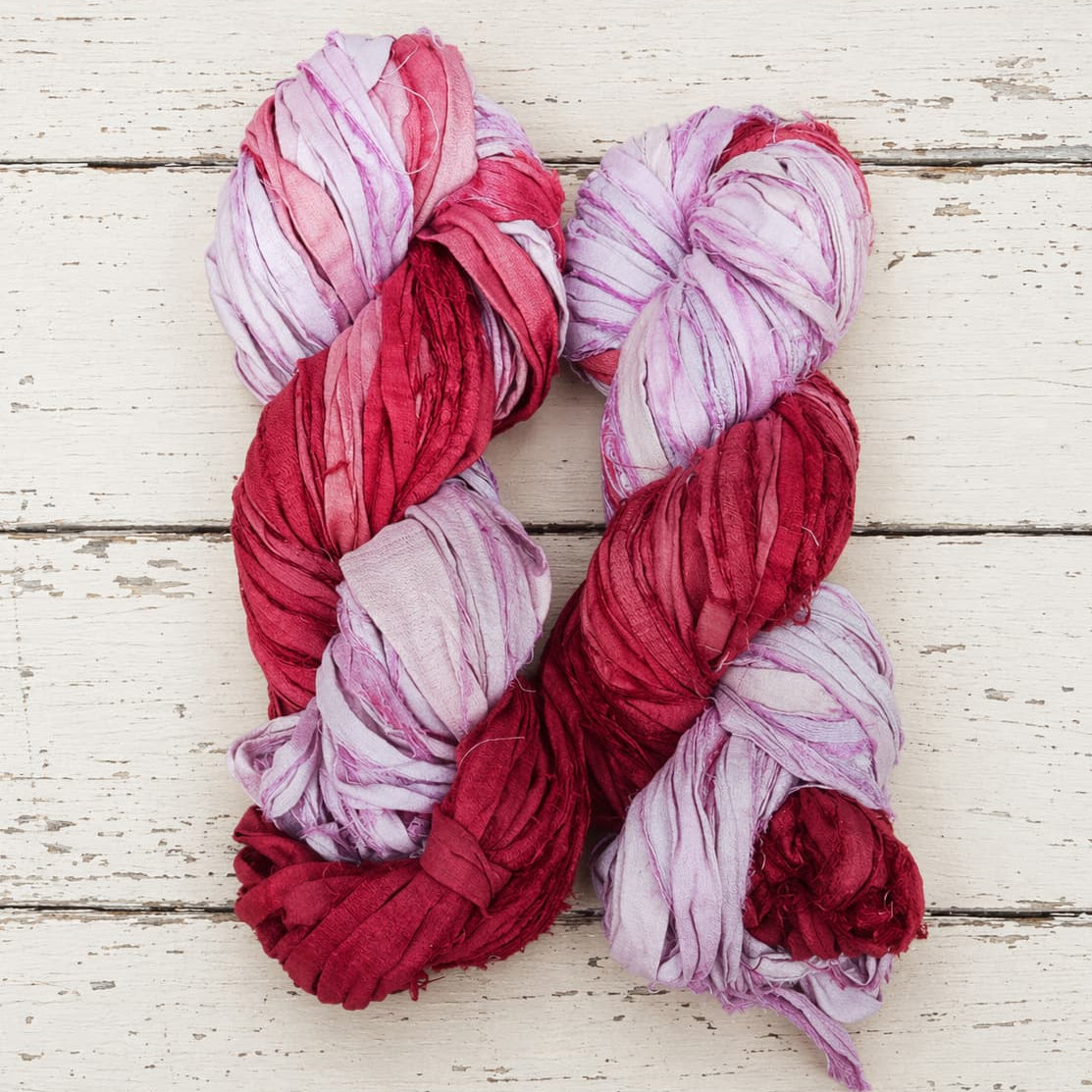 Berry Blossom recycled sari silk ribbon yarn skeins in crimson rose pink and lavender