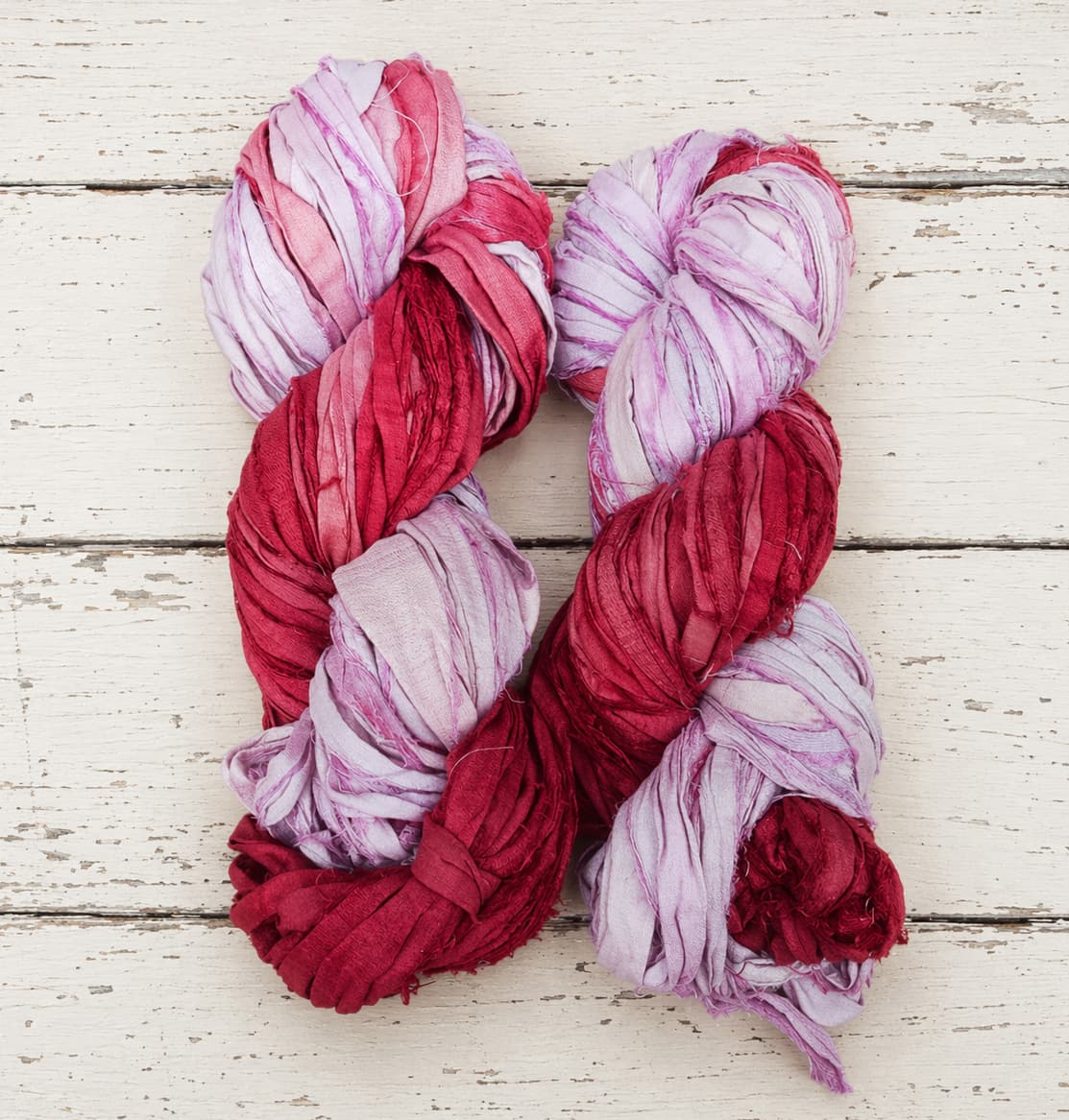 Berry Blossom recycled sari silk ribbon yarn skeins in crimson rose pink and lavender