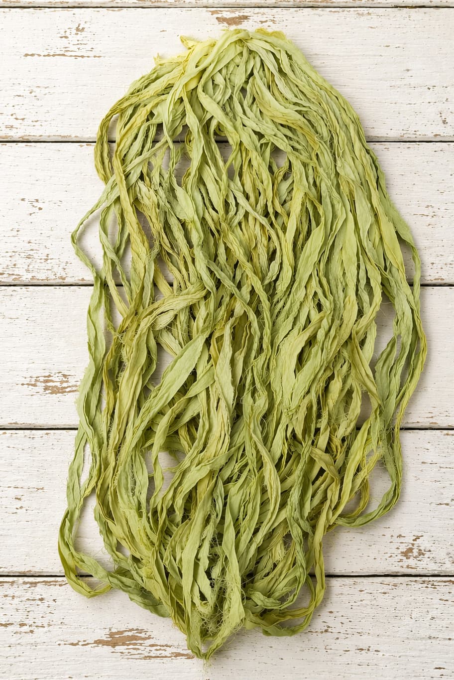 Spring Willow recycled sari silk ribbon yarn hanging strands in soft sage green