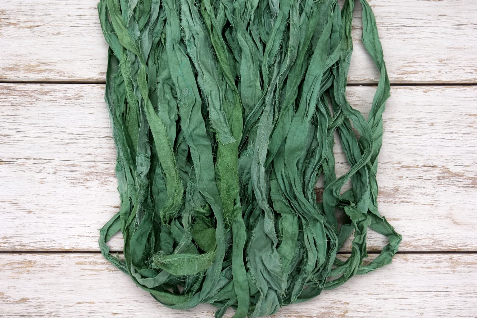 Eucalyptus sari silk ribbon texture and frayed silk strands