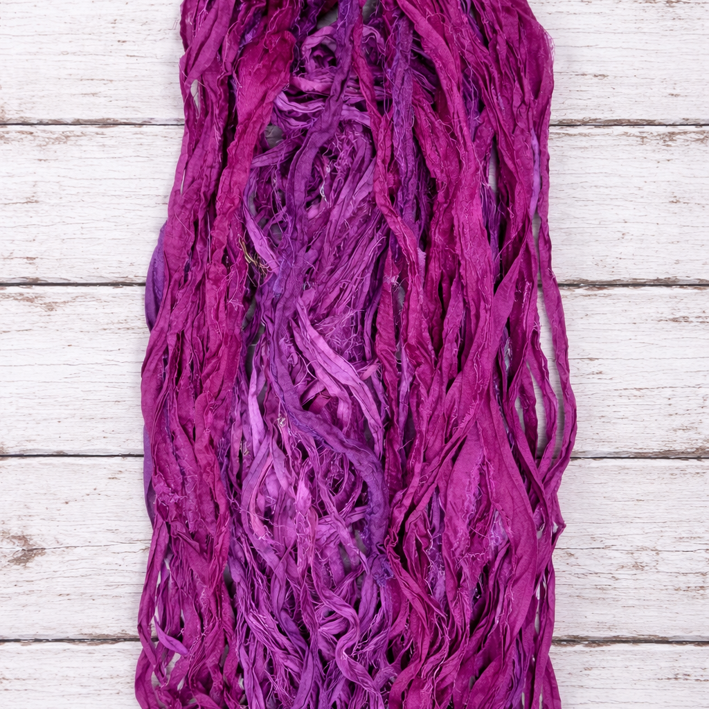 Long strands of mulberry recycled sari silk ribbon