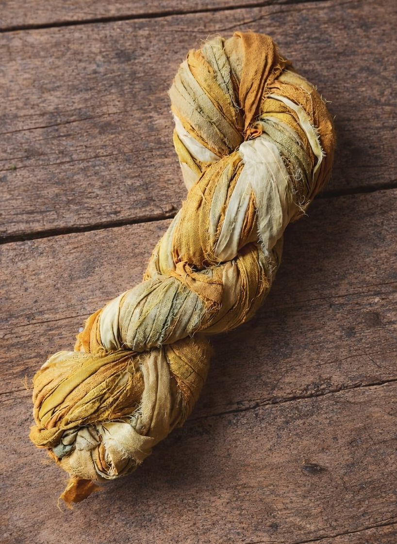 Golden Harvest recycled sari silk ribbon yarn single skein in warm mustard, wheat and honey tones