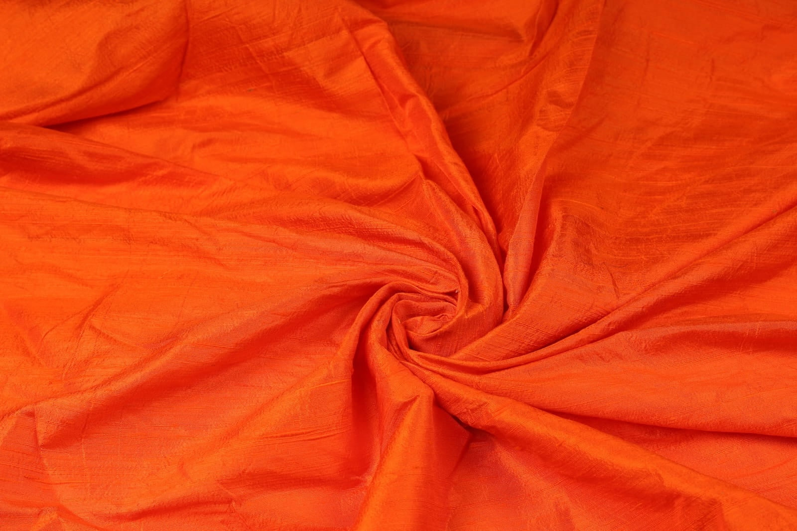 Orange Dupion Silk Fabric with natural slub texture and silk sheen