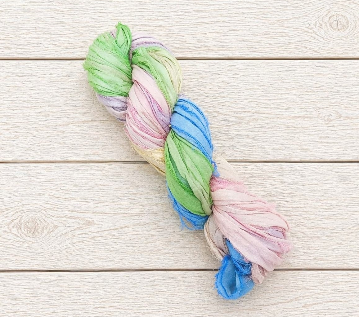 Single skein of Pastel Meadow sari silk ribbon yarn