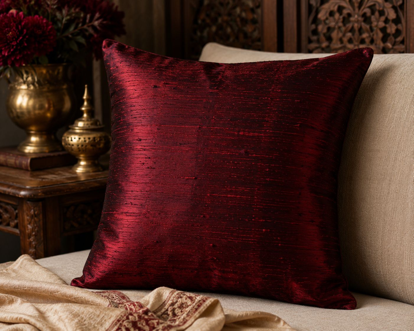 Decorative cushion cover made from ruby red Dupion silk fabric.