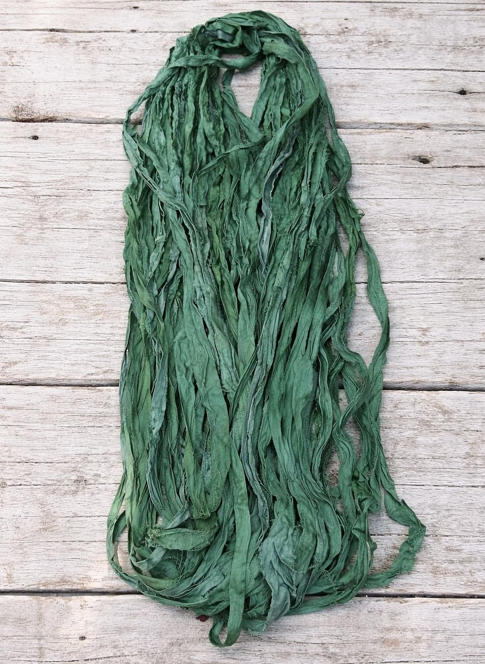 Eucalyptus sari silk ribbon bundle showing natural texture