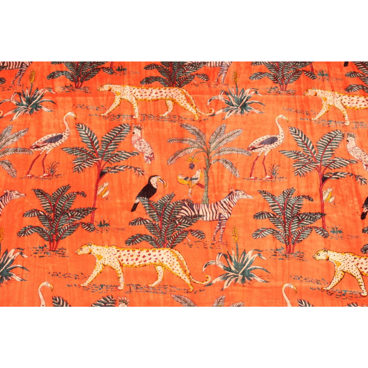 Orange hand-printed cotton velvet with cheetah, zebra & tropical birds – flatlay view