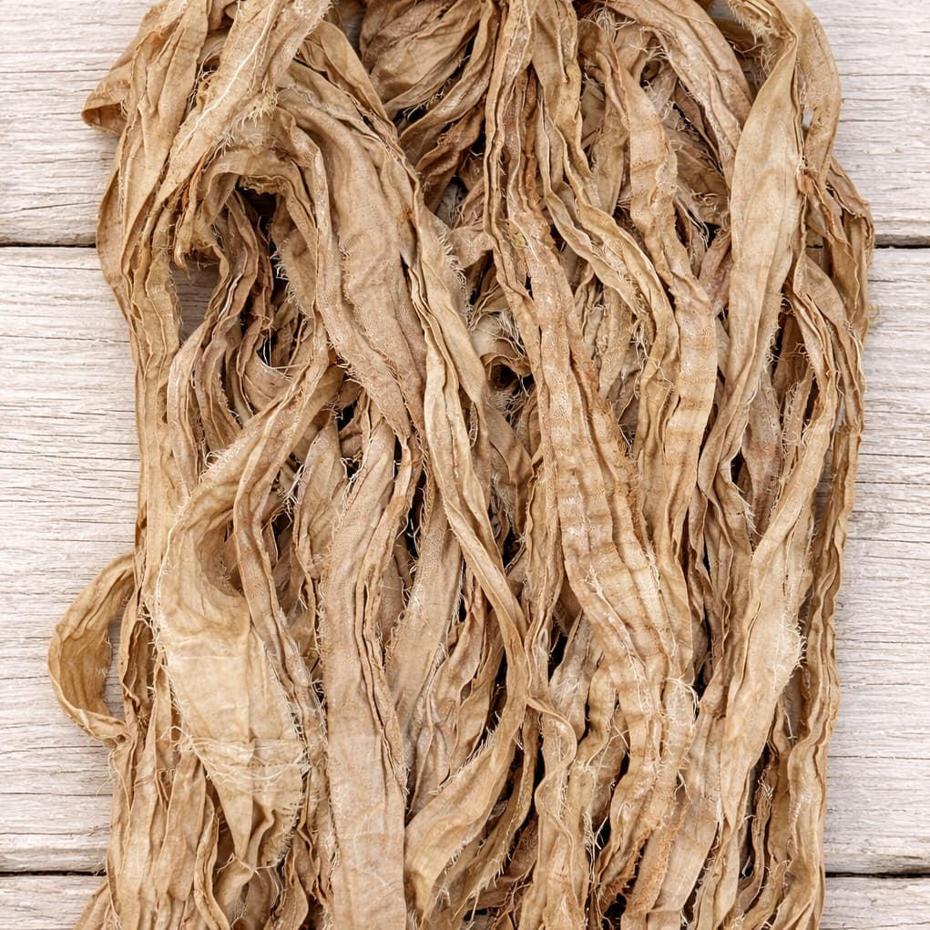 Close up texture of Camel recycled sari silk ribbon