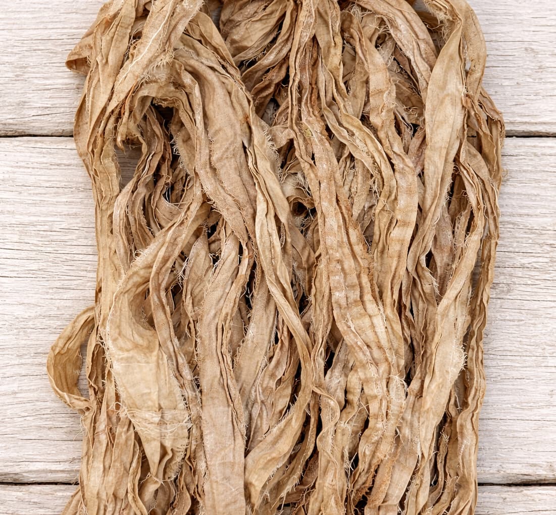 Close up texture of Camel recycled sari silk ribbon