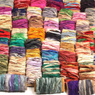 All 54 shades of sorted multi-color Sari Silk Ribbon displayed on cardboard cards
