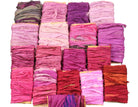 Assorted purple sari silk ribbons in 18 shades wrapped on cardboard cards