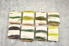 Dip dye sari silk ribbons in ivory and green tones, assorted hand-dyed shades