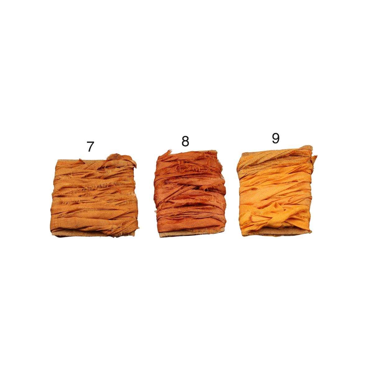Assorted orange sari silk ribbons in different tones