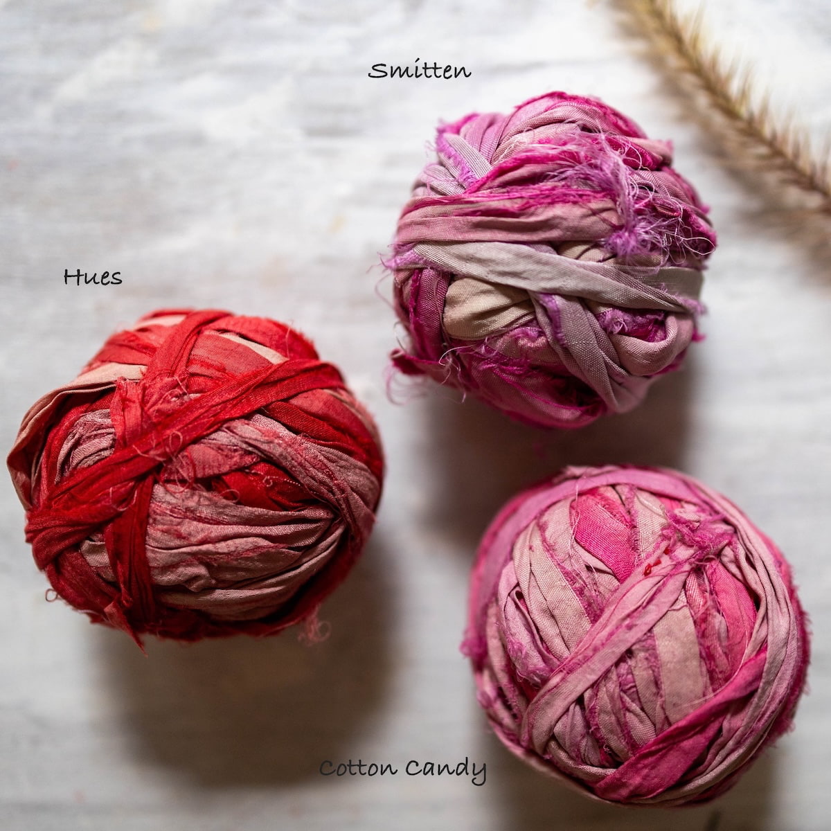 Variety of pink and red sari silk ribbons