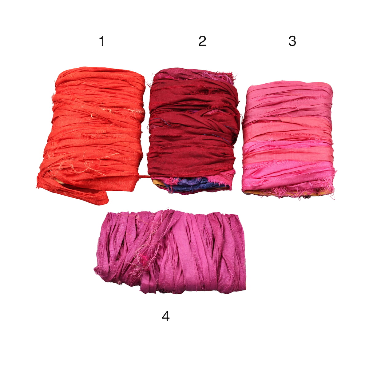 Various shades of red sari silk ribbons with dark pink tones