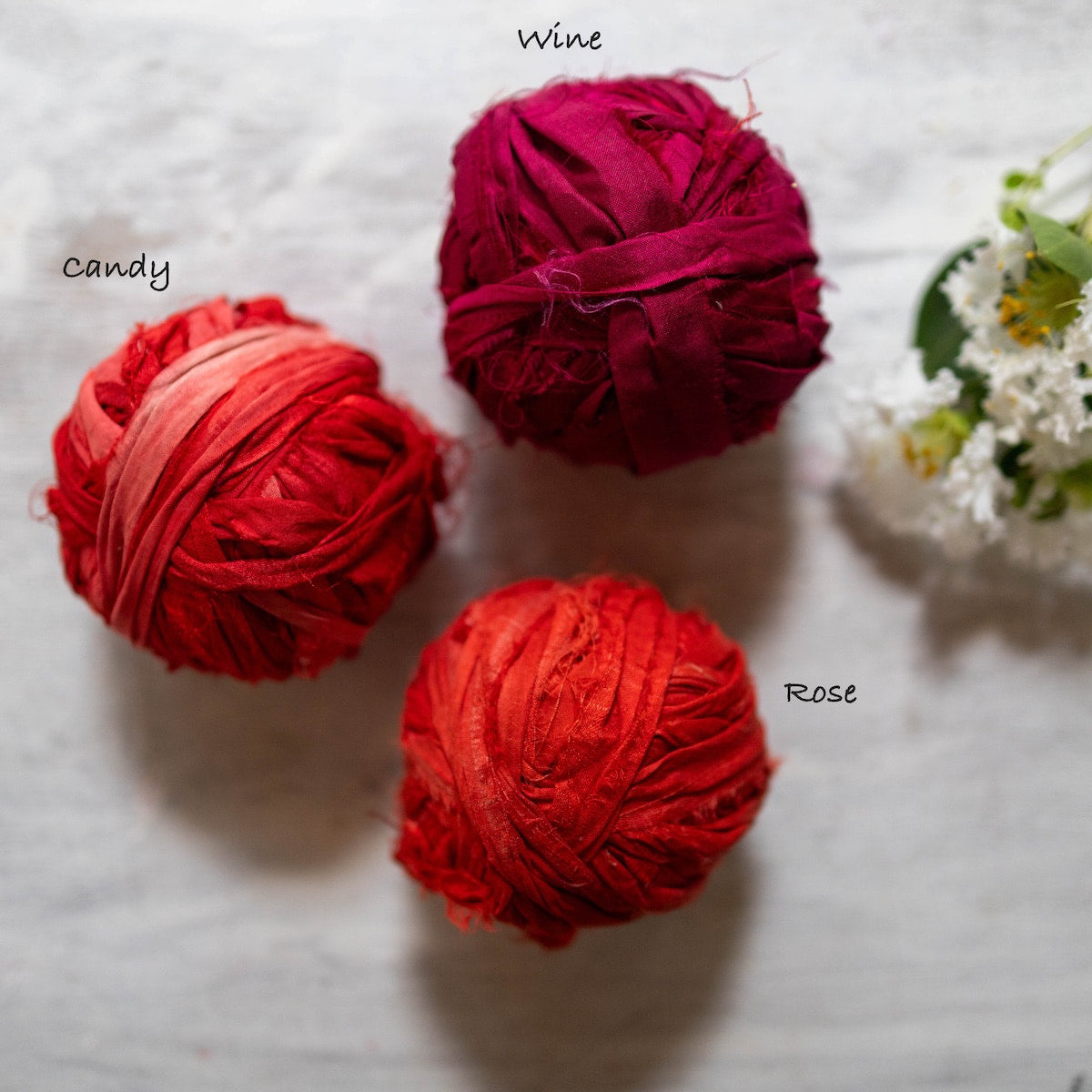 Rich shades of red sari silk ribbons