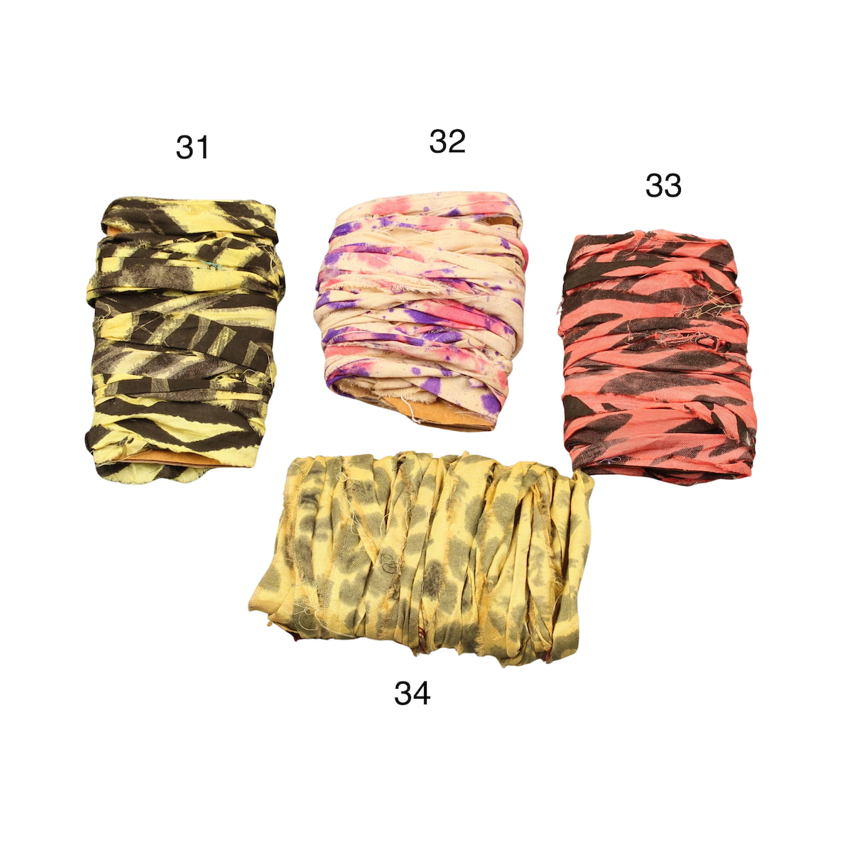 Assorted tie-dye and block-printed sari silk ribbons together