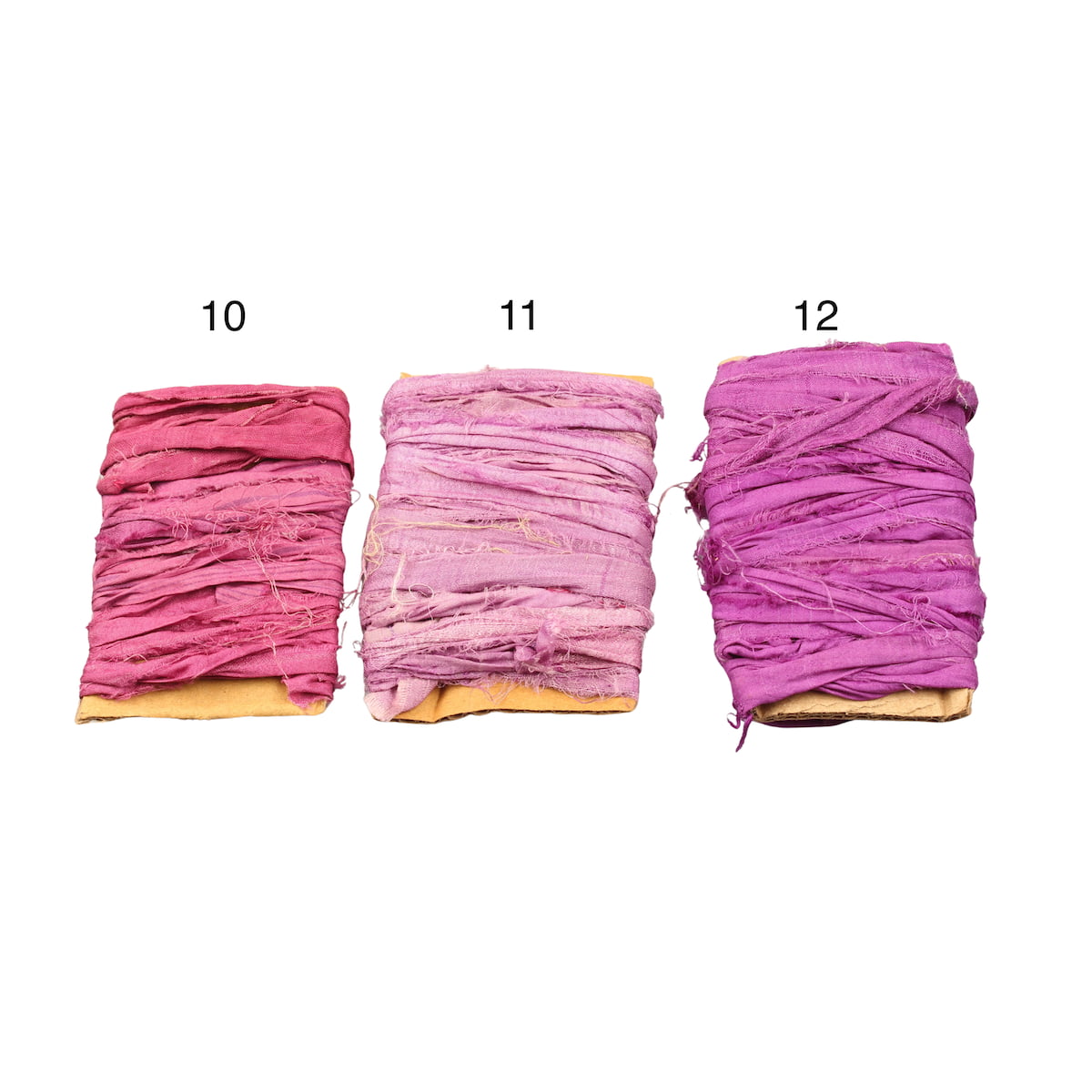 Assorted shades of purple sari silk ribbons displayed together