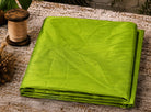 Lime Green Dupion Silk Fabric folded to showcase its vibrant citrus-green colour, natural silk texture, and luminous sheen