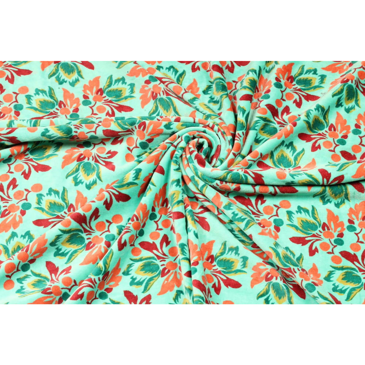 Folded green cotton velvet showing soft pile and floral print texture