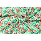 Folded green cotton velvet showing soft pile and floral print texture