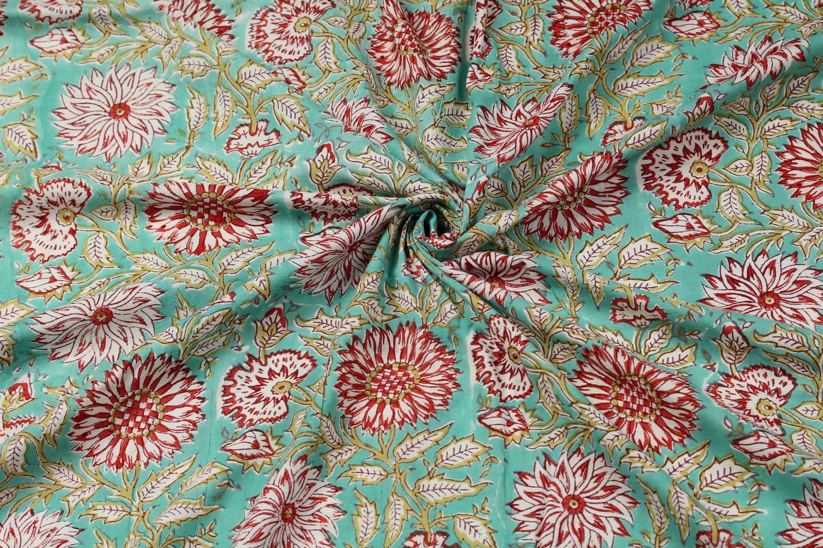 Aqua Chrysanthemum Garden floral block print cotton fabric gathered to showcase drape and texture