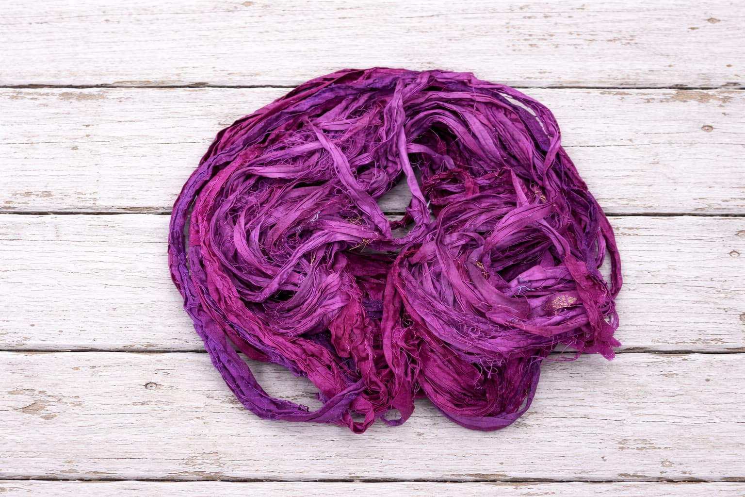 Mulberry recycled sari silk ribbon in loose ribbon form