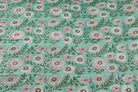 Aqua floral block print cotton fabric with pink chrysanthemum blooms and olive green vines