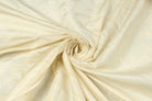 Ivory Dupion Silk Fabric arranged in elegant swirling folds highlighting its luminous sheen, crisp texture, and refined ivory colouring