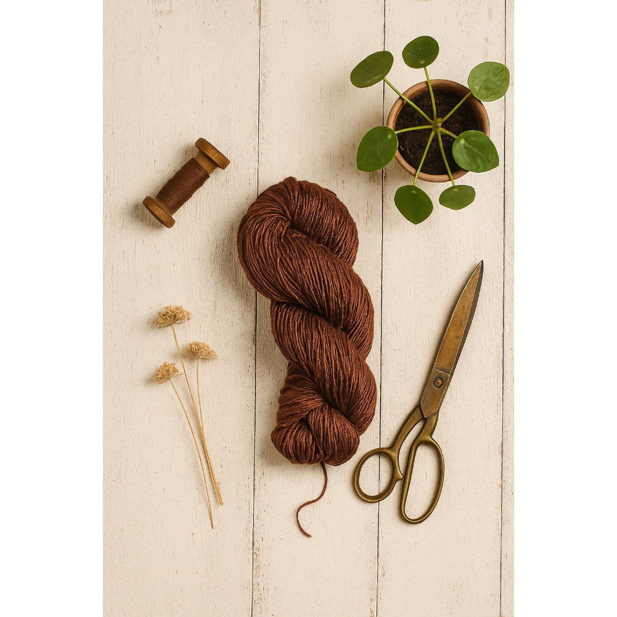 Handspun brown Eri silk yarn on an off-white table – Himalayan sustainable silk fiber