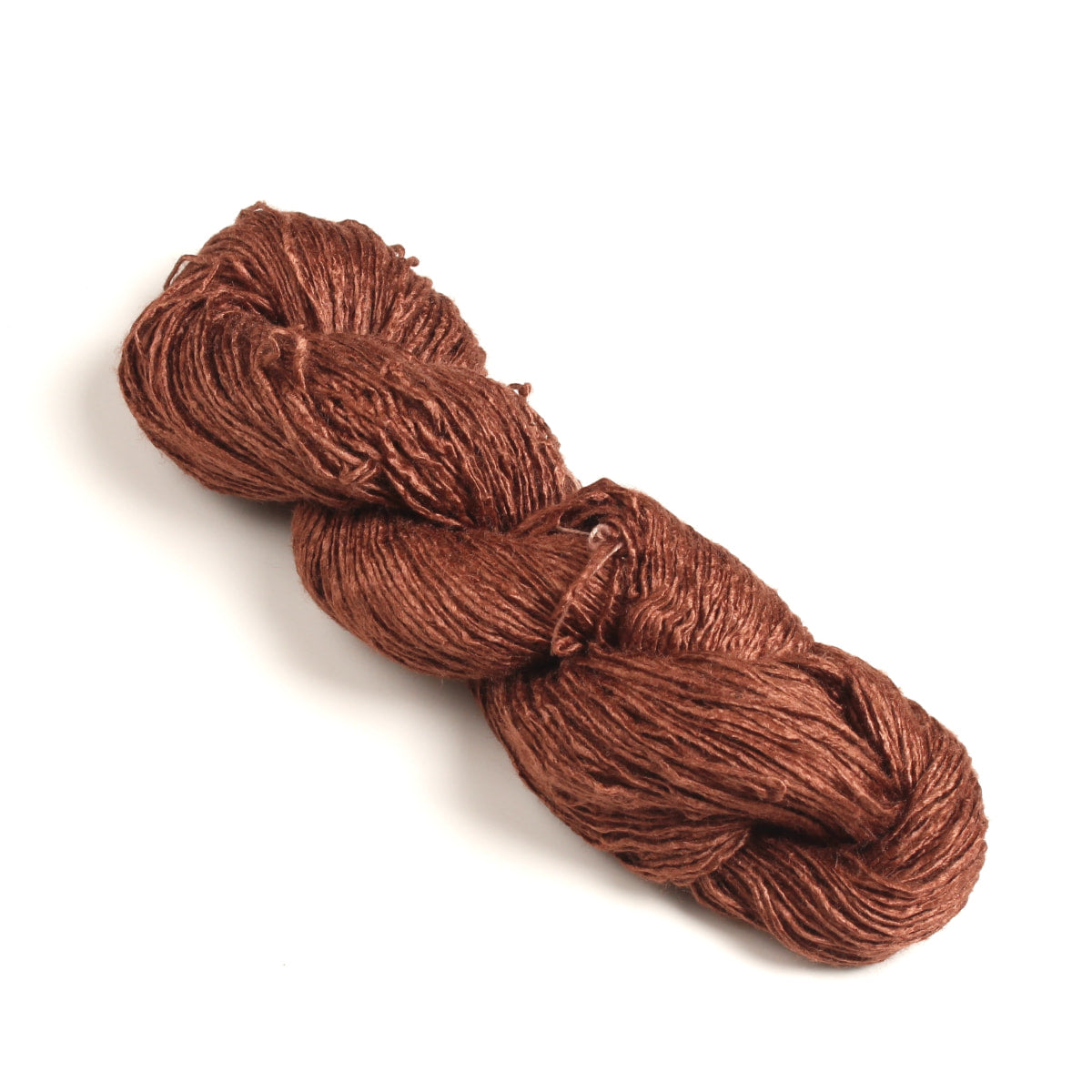 Brown handspun Eri silk yarn on white background – eco-friendly Himalayan silk yarn