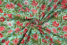 Coral Wildflower Meadow block printed cotton fabric draped to show softness and movement