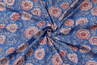 ge
Cornflower Dahlia floral block print cotton fabric gathered to display drape and texture